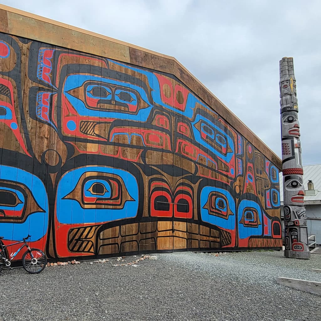Long house and totem in Heiltsuk Nation