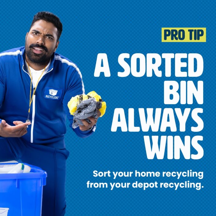 Coach Rick Cycle pulling plastic bags incorrectly sorted into blue bin
